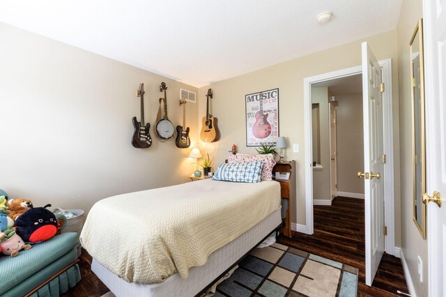 5073 Thornwood Dr, Westerville, OH 43082 - bedroom with wood finished floors and baseboards