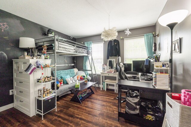 5073 Thornwood Dr, Westerville, OH 43082 - bedroom with wood finished floors, an office area, and baseboards
