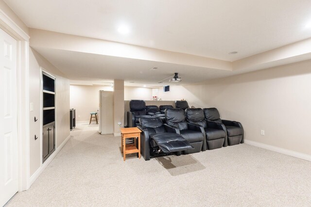 5073 Thornwood Dr, Westerville, OH 43082 - home theater with light colored carpet, baseboards, and a dry bar