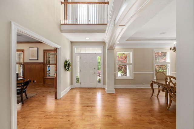 504 W Orange Rd, Delaware, OH 43015 - entryway with light wood-style floors, baseboards, and crown molding