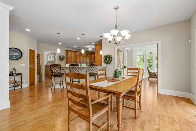 504 W Orange Rd, Delaware, OH 43015 - dining space with light wood-type flooring, recessed lighting, baseboards, and a chandelier
