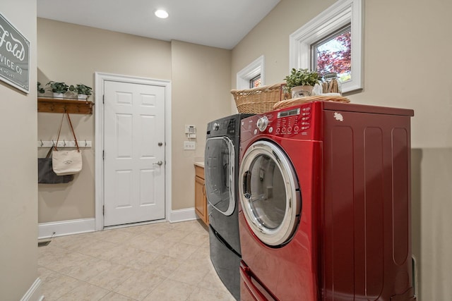 504 W Orange Rd, Delaware, OH 43015 - washroom with washer and clothes dryer, light tile patterned floors, baseboards, and recessed lighting