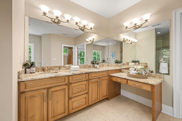 504 W Orange Rd, Delaware, OH 43015 - bathroom with double vanity and baseboards