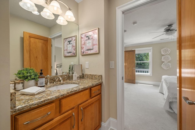 504 W Orange Rd, Delaware, OH 43015 - bathroom featuring vanity, ceiling fan, baseboards, a chandelier, and connected bathroom