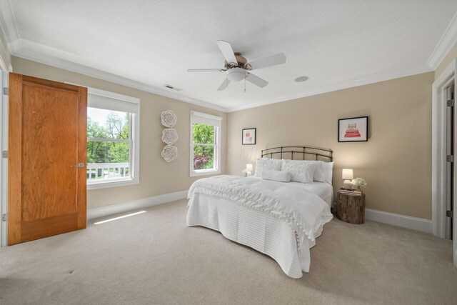 504 W Orange Rd, Delaware, OH 43015 - carpeted bedroom featuring crown molding, baseboards, and ceiling fan