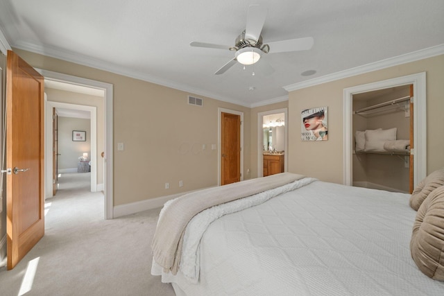 504 W Orange Rd, Delaware, OH 43015 - bedroom with light carpet, ornamental molding, a closet, a ceiling fan, and baseboards