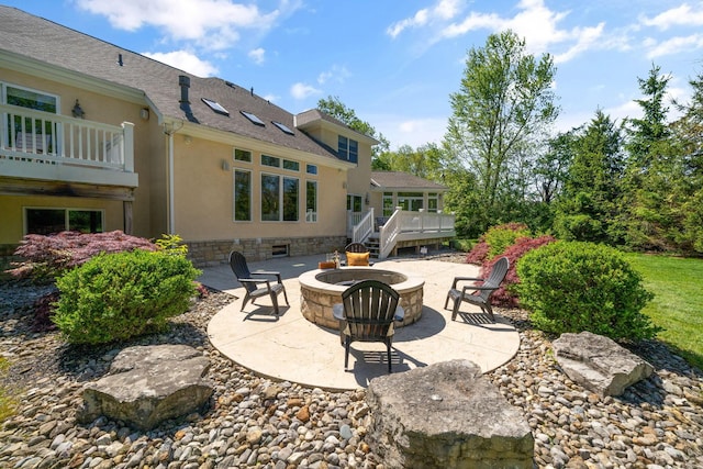 504 W Orange Rd, Delaware, OH 43015 - view of patio featuring an outdoor fire pit and a deck