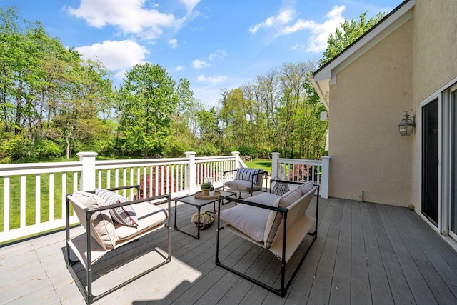 504 W Orange Rd, Delaware, OH 43015 - wooden terrace featuring an outdoor hangout area, a yard, and view of wooded area
