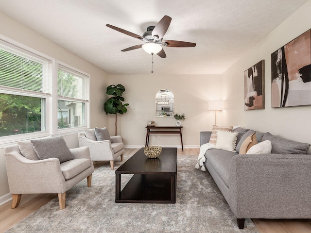 1520 Dickson Dr, Columbus, OH 43228 - living room with a ceiling fan, wood finished floors, and baseboards