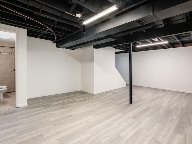 1520 Dickson Dr, Columbus, OH 43228 - finished basement with wood finished floors and baseboards