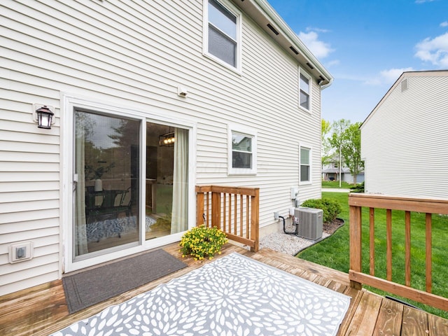1520 Dickson Dr, Columbus, OH 43228 - wooden terrace featuring central air condition unit and a yard