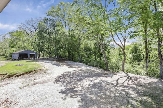 7205 W Grubb Rd NE, Thornville, OH 43076 - view of dirt / gravel road featuring an outbuilding