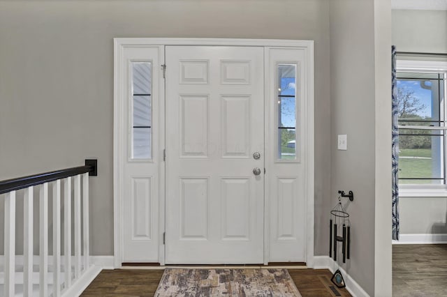 7205 W Grubb Rd NE, Thornville, OH 43076 - foyer entrance with baseboards and dark wood-type flooring