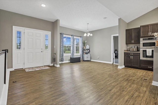7205 W Grubb Rd NE, Thornville, OH 43076 - foyer with a chandelier, wood finished floors, and baseboards