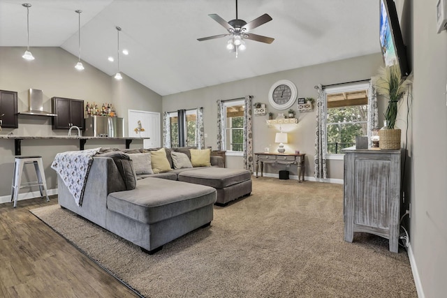 7205 W Grubb Rd NE, Thornville, OH 43076 - living area with a ceiling fan, baseboards, high vaulted ceiling, and carpet