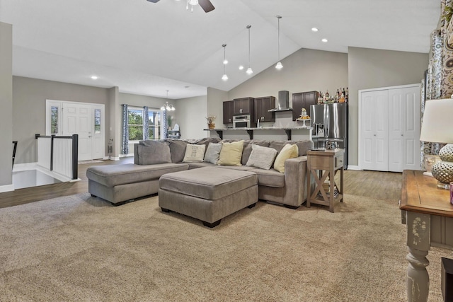 7205 W Grubb Rd NE, Thornville, OH 43076 - living room featuring light wood-style floors, baseboards, ceiling fan, recessed lighting, and high vaulted ceiling