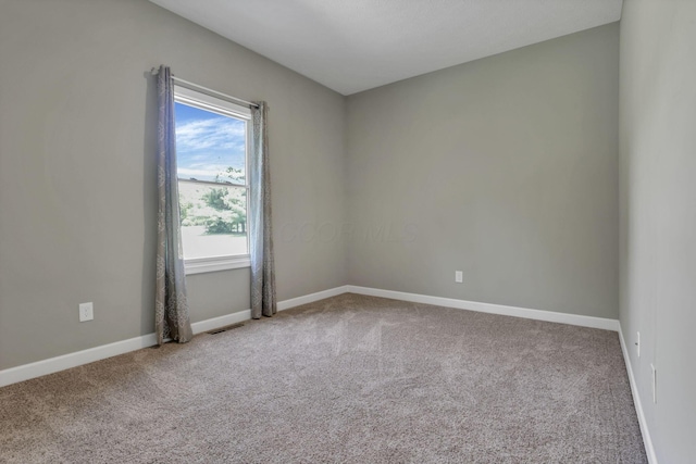 7205 W Grubb Rd NE, Thornville, OH 43076 - carpeted empty room with baseboards
