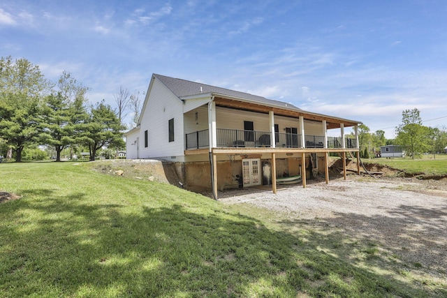 7205 W Grubb Rd NE, Thornville, OH 43076 - back of property with a deck and a lawn
