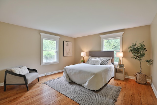 1155 Millcreek Ct, Columbus, OH 43220 - bedroom with baseboards and light wood-type flooring