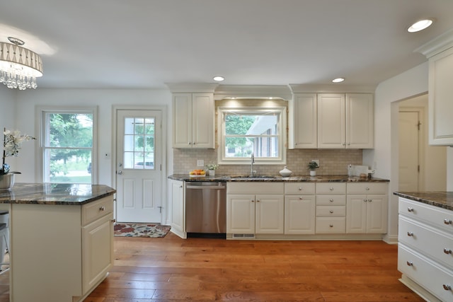 1155 Millcreek Ct, Columbus, OH 43220 - kitchen featuring dishwasher, a sink, light wood finished floors, decorative backsplash, and recessed lighting