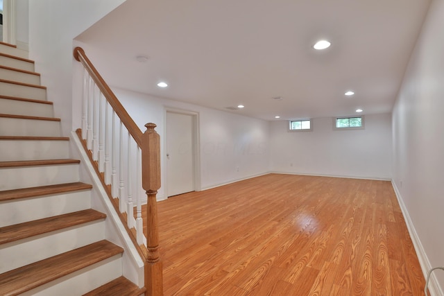 1155 Millcreek Ct, Columbus, OH 43220 - basement with light wood finished floors, stairs, recessed lighting, and baseboards