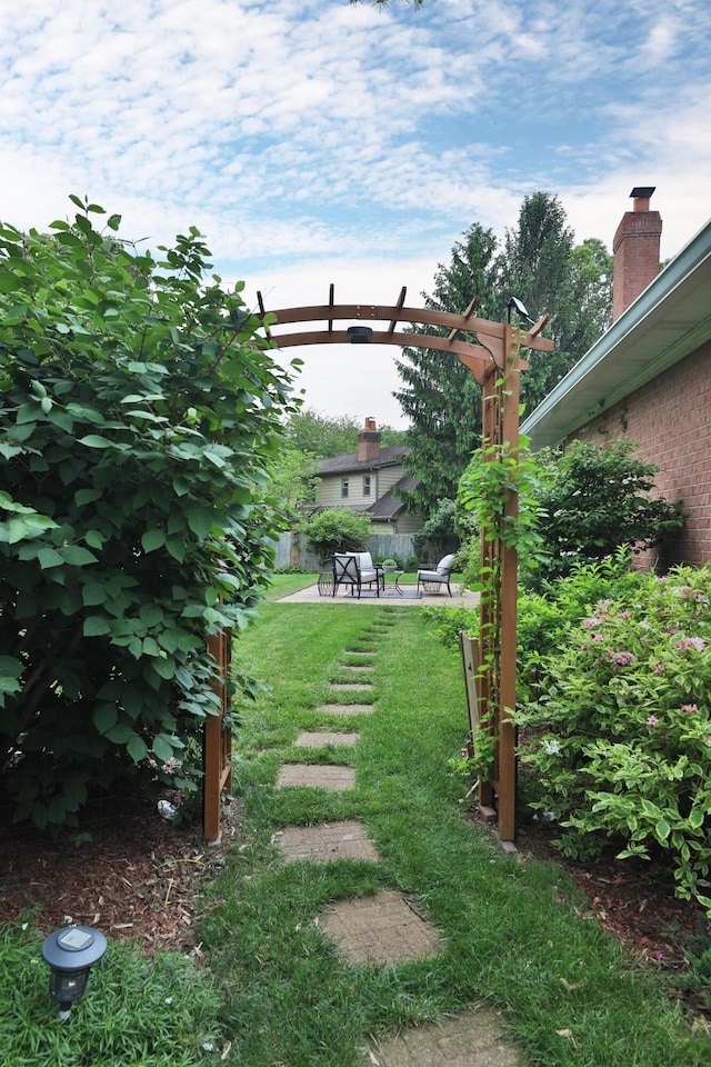 1155 Millcreek Ct, Columbus, OH 43220 - view of grassy yard featuring a patio