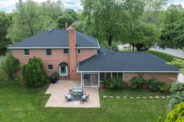 1155 Millcreek Ct, Columbus, OH 43220 - rear view of house with roof with shingles, a patio, a chimney, and a lawn