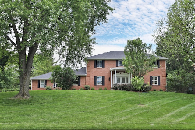 1155 Millcreek Ct, Columbus, OH 43220 - colonial-style house with brick siding and a front yard