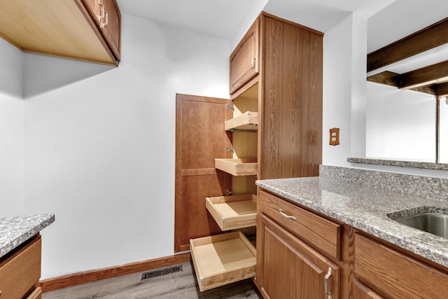 144 W Ticonderoga Dr Unit H, Westerville, OH 43081 - spacious closet with dark wood-style floors