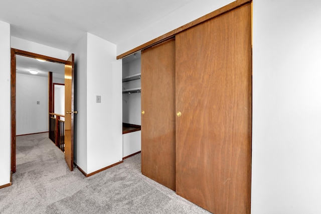 144 W Ticonderoga Dr Unit H, Westerville, OH 43081 - unfurnished bedroom with carpet floors, a closet, and baseboards