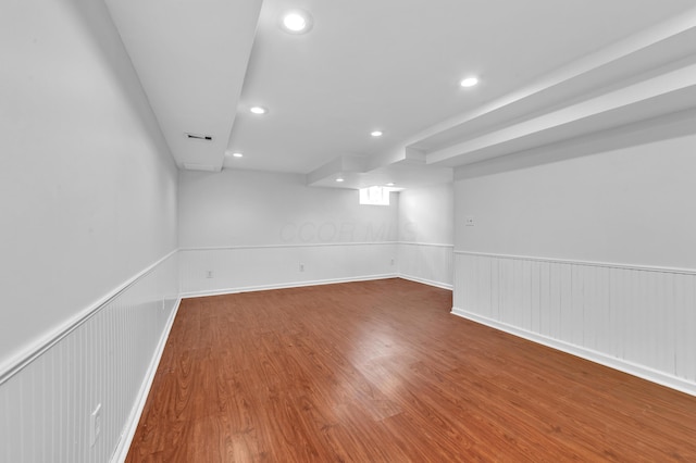 144 W Ticonderoga Dr Unit H, Westerville, OH 43081 - unfurnished room featuring a wainscoted wall, wood finished floors, and recessed lighting