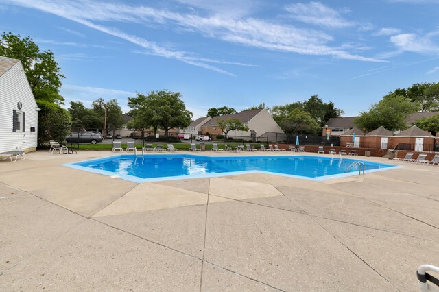 144 W Ticonderoga Dr Unit H, Westerville, OH 43081 - community pool featuring a patio area