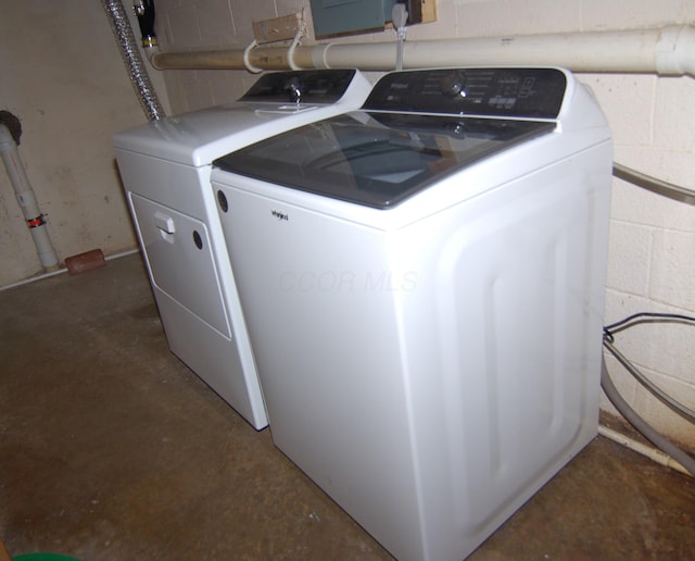 144 W Ticonderoga Dr Unit H, Westerville, OH 43081 - washroom featuring washer and dryer and concrete block wall