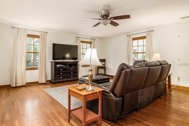 2731 E Broad St, Bexley, OH 43209 - living area featuring a ceiling fan, baseboards, and wood finished floors