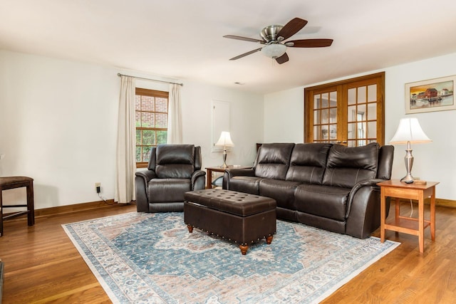2731 E Broad St, Bexley, OH 43209 - living room with ceiling fan, wood finished floors, and baseboards