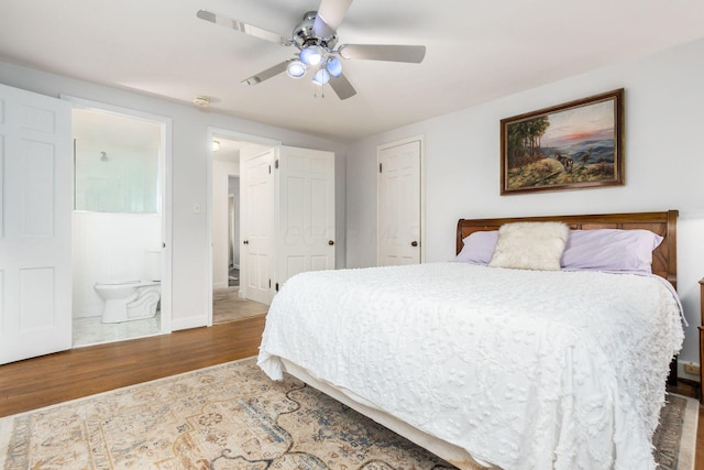 2731 E Broad St, Bexley, OH 43209 - bedroom featuring wood finished floors, ensuite bath, baseboards, and ceiling fan