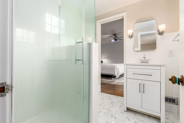 2731 E Broad St, Bexley, OH 43209 - ensuite bathroom with a stall shower, ceiling fan, and vanity