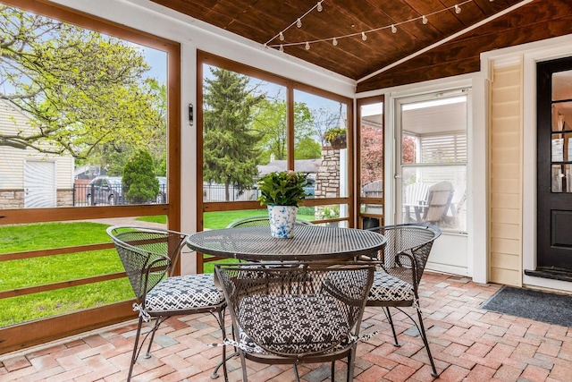 2731 E Broad St, Bexley, OH 43209 - sunroom with outdoor dining space and lofted ceiling