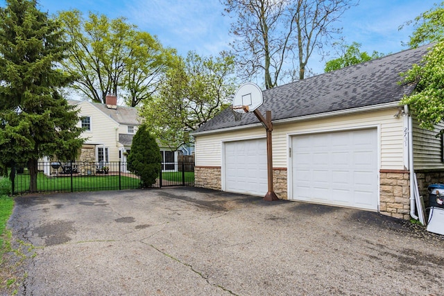2731 E Broad St, Bexley, OH 43209 - garage featuring asphalt driveway