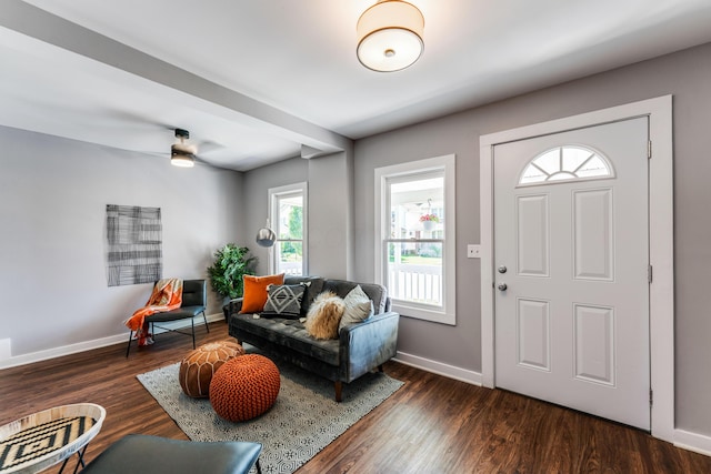 686 Frebis Ave, Columbus, OH 43206 - living room featuring baseboards, dark wood-type flooring, and ceiling fan