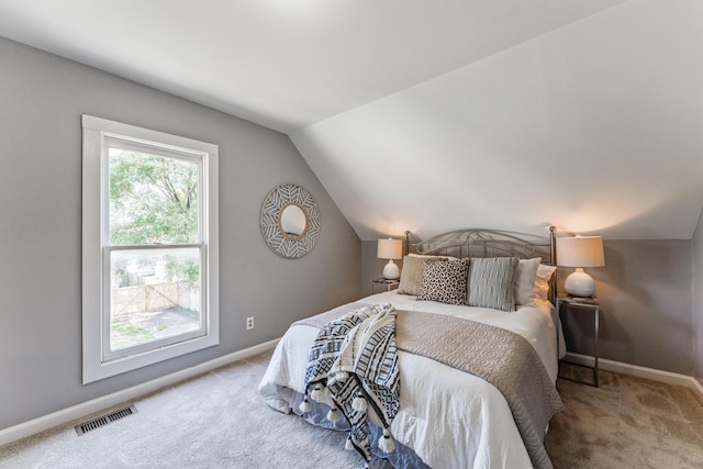 686 Frebis Ave, Columbus, OH 43206 - bedroom featuring carpet flooring, lofted ceiling, and baseboards