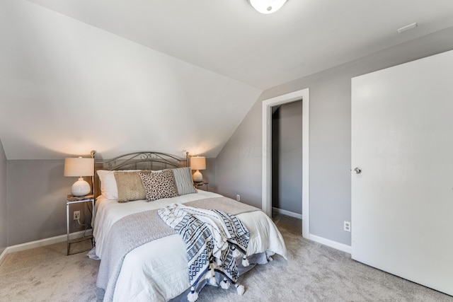 686 Frebis Ave, Columbus, OH 43206 - carpeted bedroom featuring vaulted ceiling and baseboards