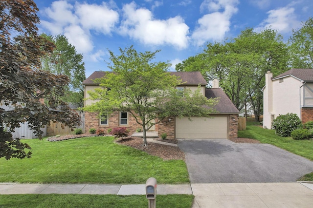 view of front of home featuring brick siding, driveway, a front yard, and a chimney