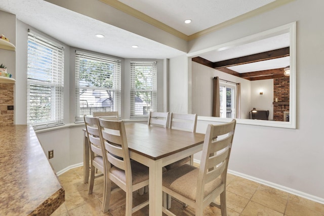 dining room with baseboards, beam ceiling, recessed lighting, and ornamental molding
