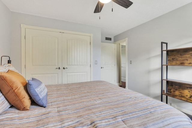bedroom featuring a closet and a ceiling fan
