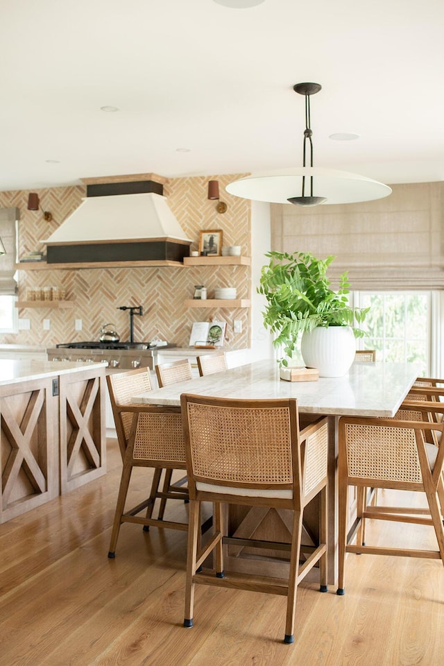 8070 Harriott Rd, Dublin, OH 43017 - dining space featuring light wood finished floors