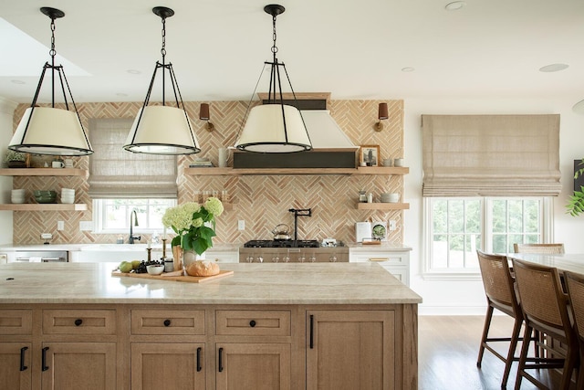 8070 Harriott Rd, Dublin, OH 43017 - kitchen with open shelves, decorative backsplash, premium range hood, light wood-style flooring, and pendant lighting