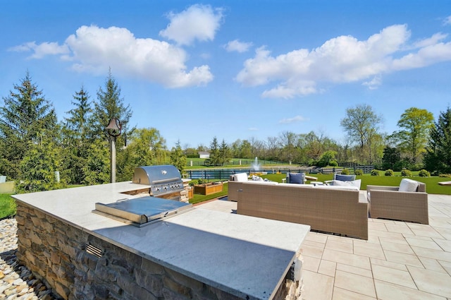 8070 Harriott Rd, Dublin, OH 43017 - view of patio / terrace with area for grilling, exterior kitchen, and an outdoor hangout area