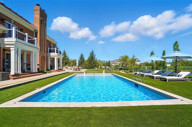 8070 Harriott Rd, Dublin, OH 43017 - view of swimming pool with a lawn and a patio area