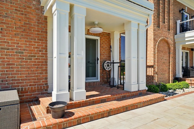 8070 Harriott Rd, Dublin, OH 43017 - view of exterior entry with brick siding and a porch